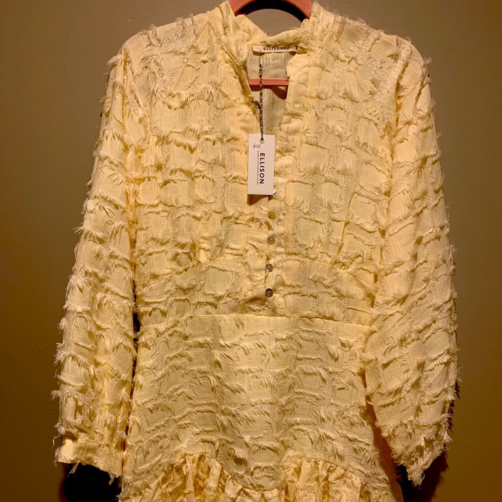 Boutique rich cream colored -tattered dress with capri shell buttons